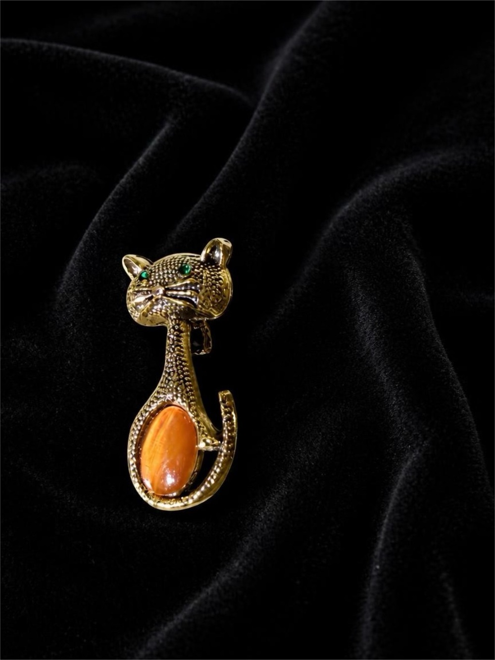 Gold Cat Brooch with Orange Stone and Green Accents